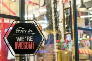 Storefront with inviting sign